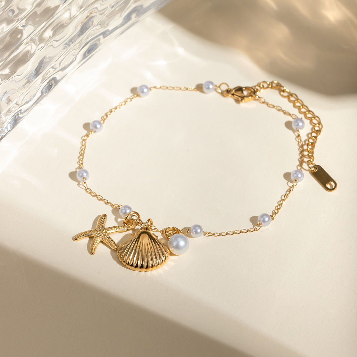 ocean whisper anklet maritime anhänger vergoldet