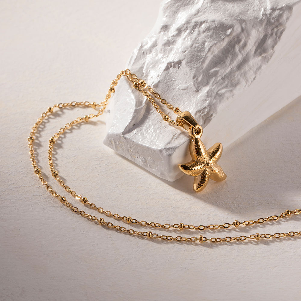 golden starfish schmuck filigranes design