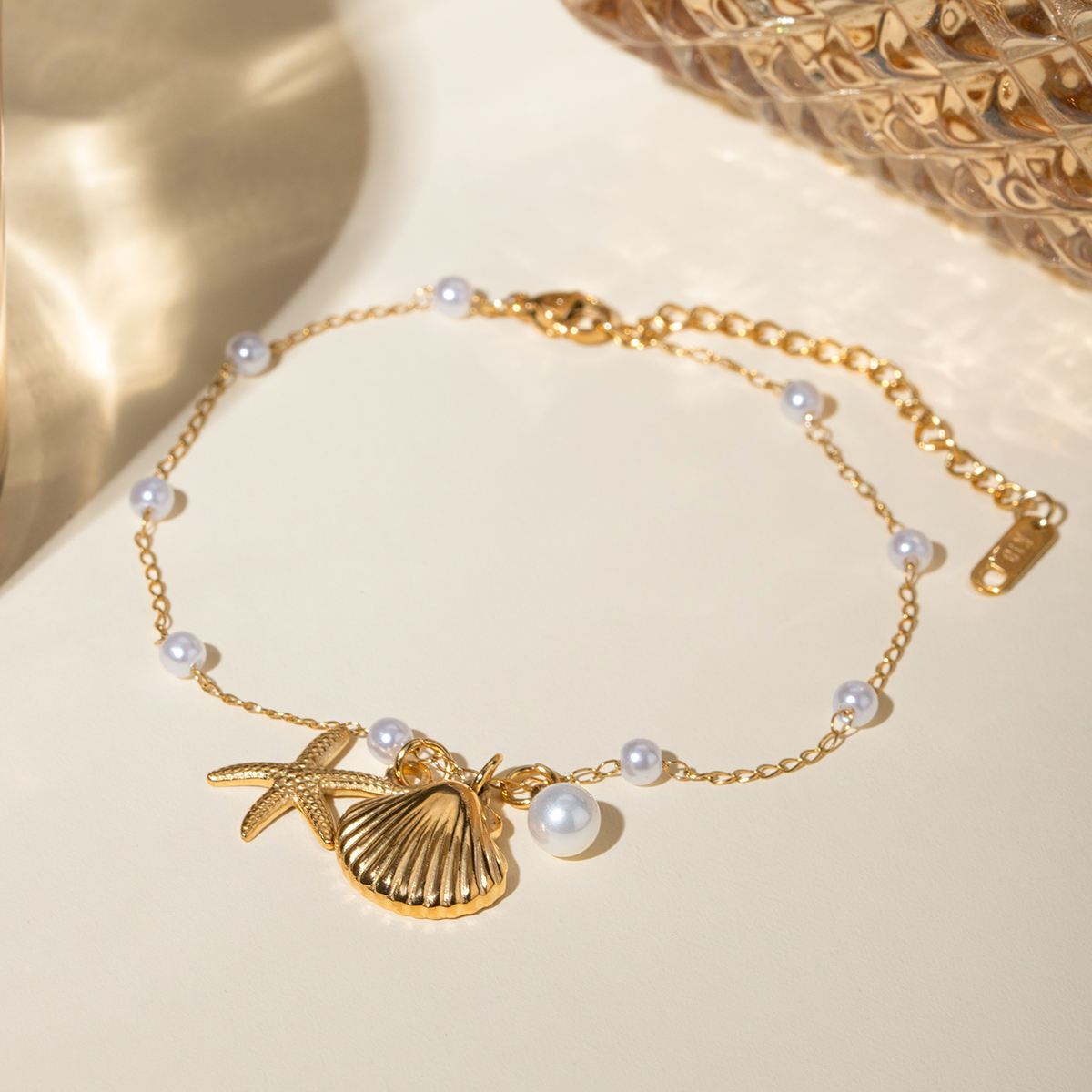 ocean whisper anklet details seestern muschel ansicht